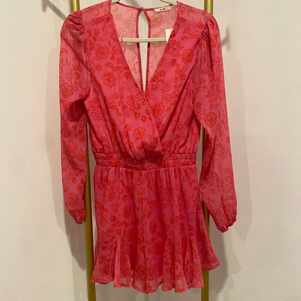 Francesca’s pink and red long sleeve romper